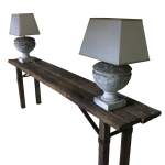 Rustic console with aged iron bracing